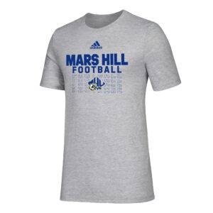 gray tshirt with Mars Hill Football in blue, with Football repeating vertically downward in an outlined font, and MHU athletics logo